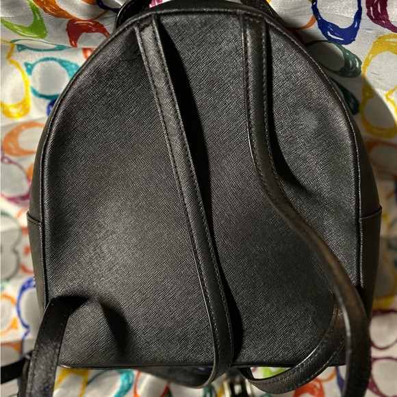 Bag is in good condition. Clean interior! Measures approximately 10” by 10”. - Picture 6 of 7